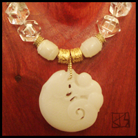 carved jade bi rock crystal necklace